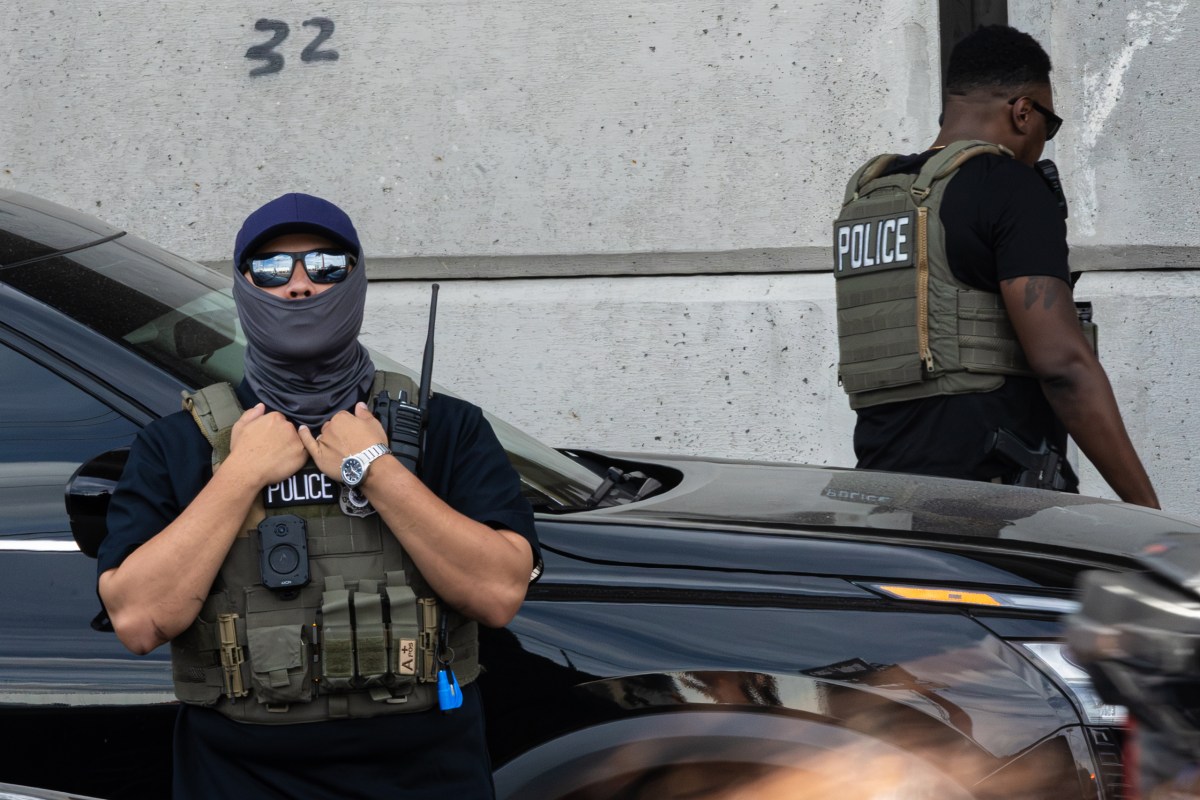 Immigration and Customs Enforcement agents at the scene where Wilber Rafael Garces Perez, a Venezuelan man, was shot and injured in Austin on Sept. 20, 2026.