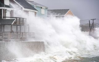 A persistent nor’easter batters US Northeast, causing coastal flooding, outages and at least 1 death