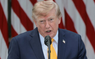 Trump says his planned arch will double as a military complex housing drones and snipers