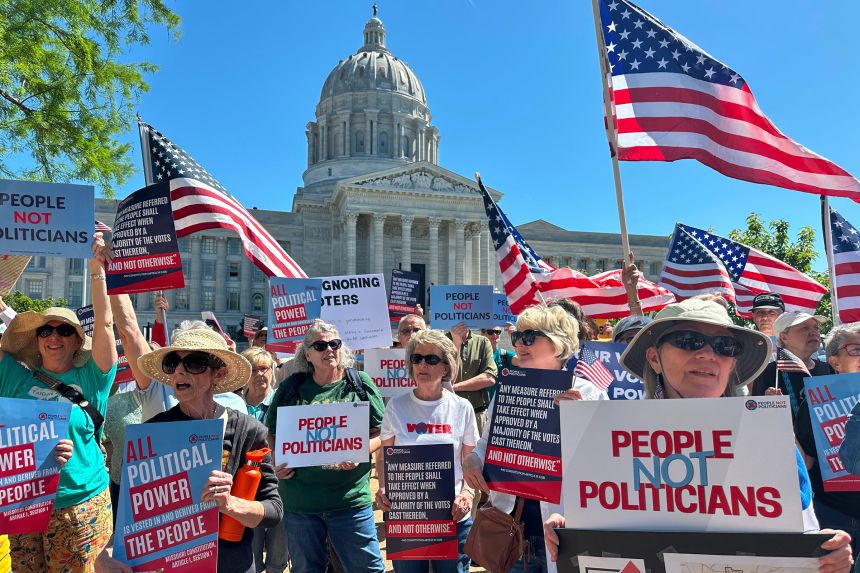 Protesters against Missouri's congressional redistricting plan gather outside the Missouri Capitol in Jefferson City on May 12.