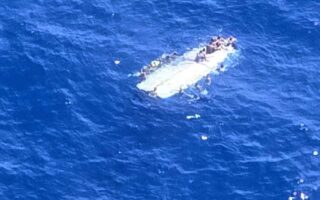 people rescued and several missing after boat capsizes in waters west of Puerto Rico