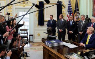 Judge hears arguments without immediately ruling in lawsuit over White House ban on 3 news outlets