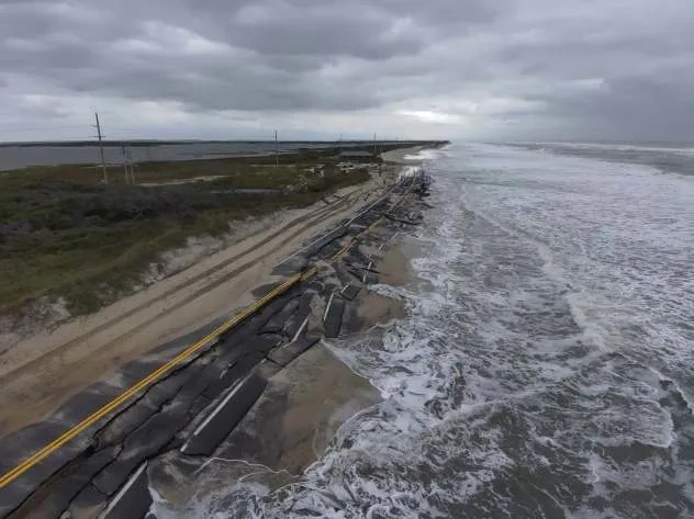 An aerial view of Highway 12 between Basnight Bridge and Rodanthe, North Carolina, after a coastal storm washed away chunks of the highway. (Image: NC DOT)