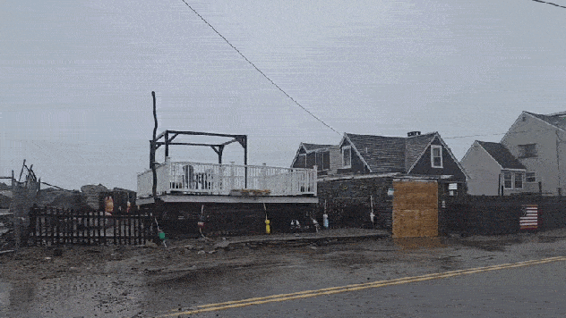 Powerful waves from a nor'easter crash over homes in Scituate, Massachusetts, on Sept. 26, 2026. (Image: Tony Laubach)