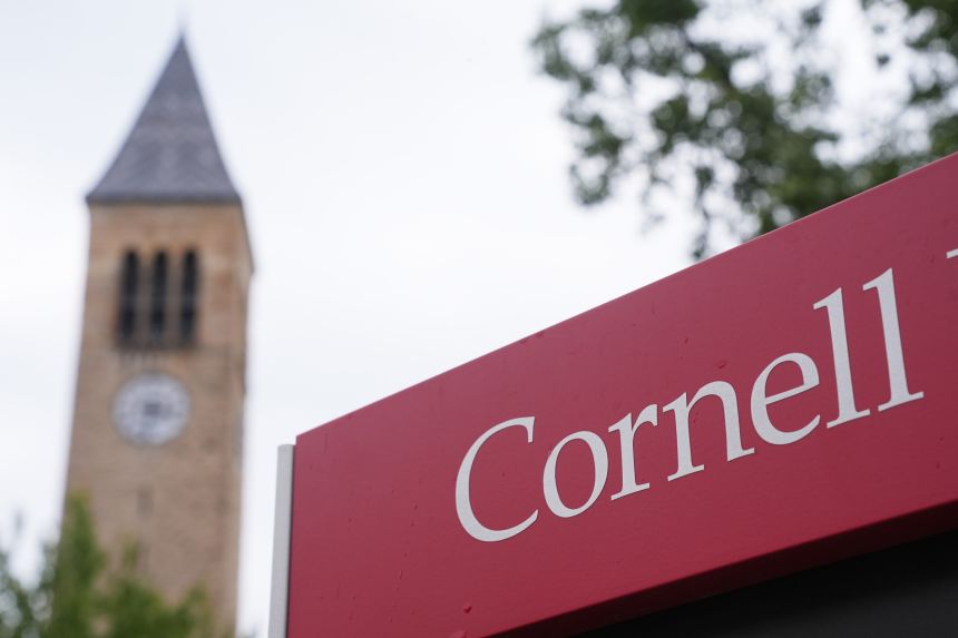 A sign is displayed Thursday at Cornell University in Ithaca, New York.