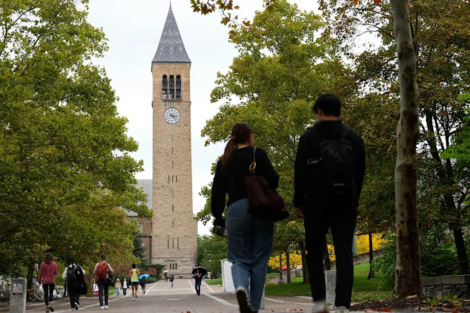 Pedestrians walk on the campus at Cornell University in Ithaca, N.Y., Thursday, Oct. 1, 2026.