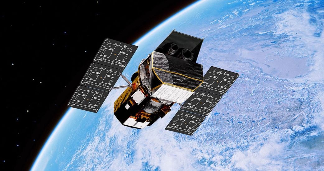 NASA’s Swift Observatory orbits above Earth in an artist’s concept.